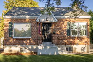 View of front of house featuring a front yard