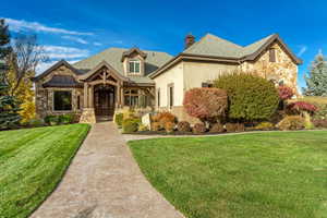 View of front of property with a front yard