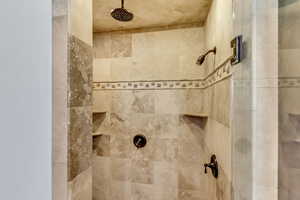 Details featuring tiled shower