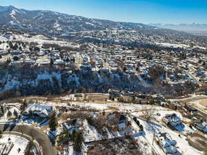 Snowy aerial view with a mountain view