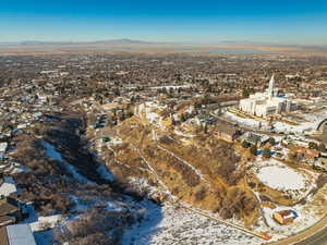 Snowy aerial view with a mountain view