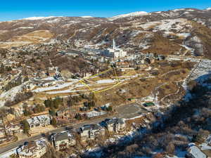 Snowy aerial view with a mountain view