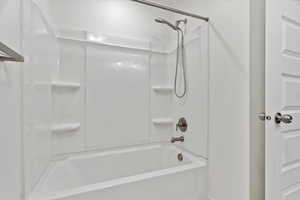 Bathroom featuring shower / bathing tub combination