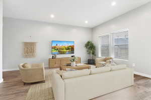 Family Room with hardwood / wood-style floors