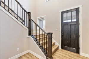 Foyer with light wood-type flooring