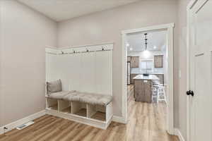 Mudroom featuring light hardwood / wood-style flooring