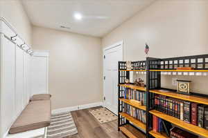 Interior space with hardwood / wood-style floors