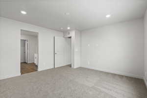 Unfurnished bedroom featuring carpet flooring