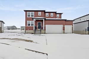 View of front of house with a garage