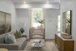 *Model Home Photo. Living room with light hardwood / wood-style floors