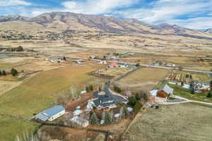 Drone / aerial view featuring a mountain view and a rural view