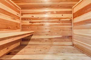 View of sauna / steam room with hardwood / wood-style flooring