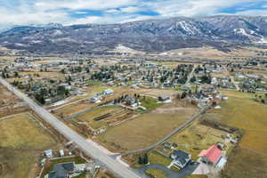 Birds eye view of property with a mountain view