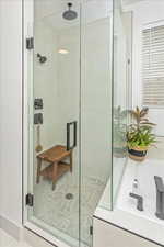 Bathroom featuring a shower with shower door