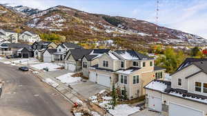 Snowy aerial view with a mountain view