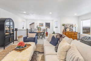 Living room featuring light carpet