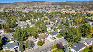 Birds eye view of property with a mountain view