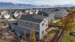 Bird's eye view featuring a water and mountain view