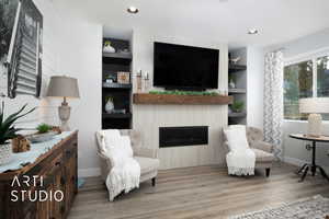 Sitting room featuring light wood-type flooring