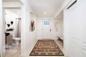 Foyer entrance featuring light wood-type flooring