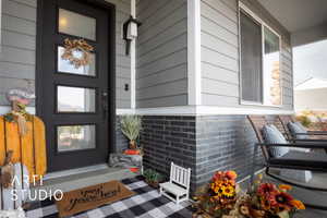 Property entrance featuring a porch