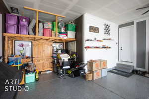 Garage featuring ceiling fan