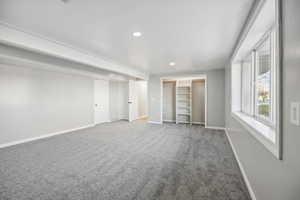 Unfurnished bedroom featuring carpet