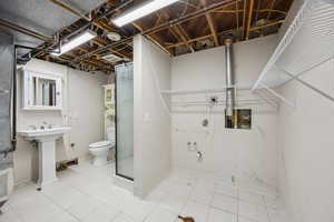 Interior space with electric dryer hookup and sink