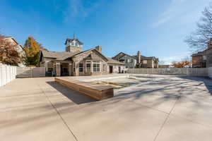 Rear view of house with a patio