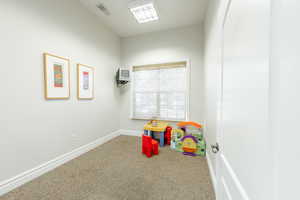 Recreation room featuring carpet