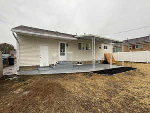 Back of property featuring a patio