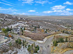 Birds eye view of property with a mountain view