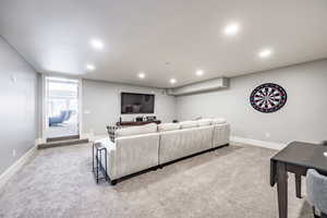 Living room featuring light colored carpet