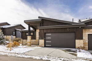 View of front of home featuring a garage