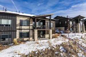 View of snow covered property