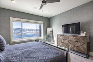 Bedroom featuring carpet flooring and ceiling fan