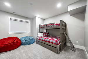 Bedroom featuring carpet flooring