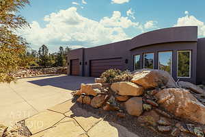 View of front of property with a garage