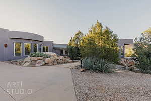 View of front of home featuring a patio