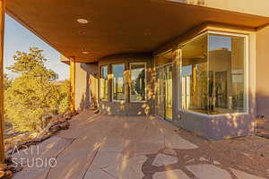 View of covered patio off the greatroom and office.