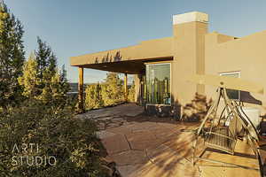 View of covered patio of the office and greatroom.