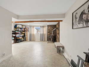 Sitting room featuring a wood stove