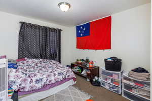 Bedroom featuring carpet floors