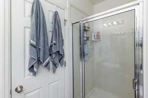 Bathroom with an enclosed shower