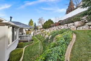 View of yard featuring a deck