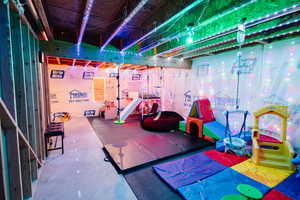 Interior space featuring concrete flooring