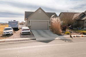 View of front of house with a garage