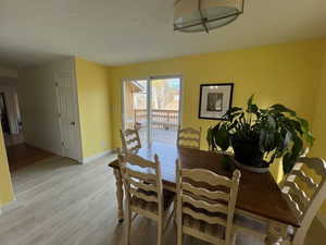 Dining space featuring light wood-type flooring