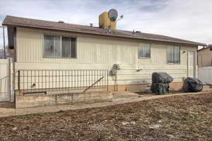 View of rear view of house.  Fresh exterior paint