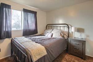 View of carpeted bedroom